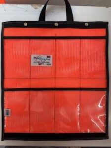 A red bag with some black handles and a yellow strip