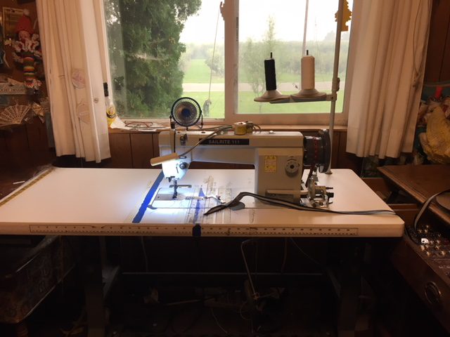picture of the sailrite111 sewing machine in my sewing room with the window outside