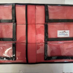 A red and black bag with many compartments